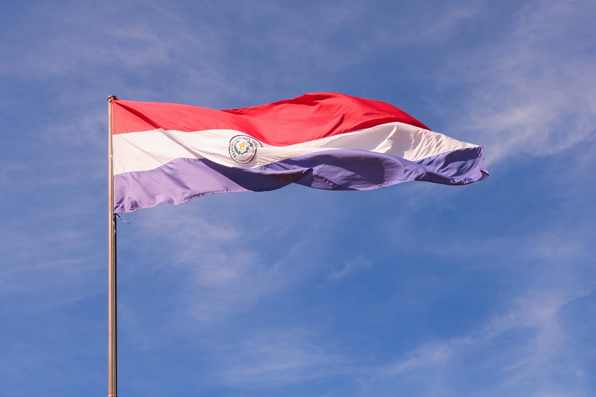 clau_bel-flag-7382391_1920 site selection in Paraguay